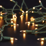 Holiday Living Cadena de luces navideñas enchufables incandescentes blancas de 100 unidades de 20,62 pies